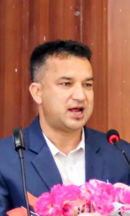 Suresh Thapa Speaking at Podium